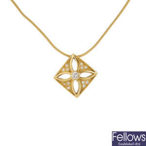 An 18ct gold diamond pendant. 