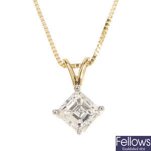 A diamond single-stone pendant.