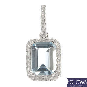An 18ct gold aquamarine and diamond pendant.