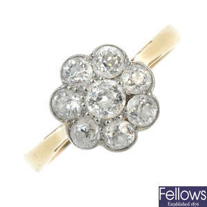 An early 20th century 18ct gold and platinum diamond floral cluster ring.