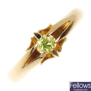 An early 20th century 18ct gold colour treated 'yellow' diamond single-stone ring.
