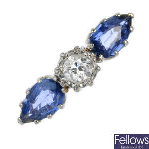 A mid 20th century 18ct gold and platinum, diamond and sapphire three-stone ring.