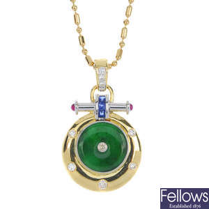 A jade, sapphire, ruby, and diamond pendant with chain.