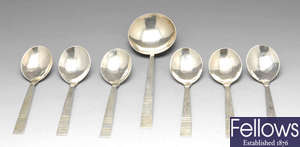 A modern set of six silver fruit or dessert spoons, etc.