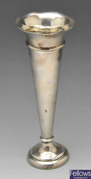 An Edwardian silver bud vase, etc.