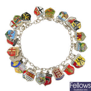 Two charm bracelets and a selection of loose charms.