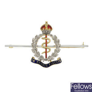 An early 20th century 15ct gold diamond and enamel Royal Army Medical Corps brooch.