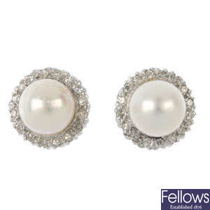 A pair of cultured pearl and diamond cluster ear studs.