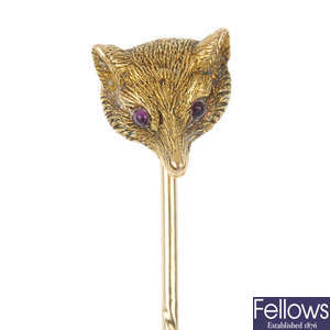An early 20th century gold fox head stickpin.