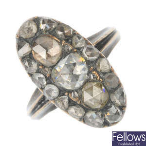 A mid 19th century 10ct gold and silver diamond panel ring.