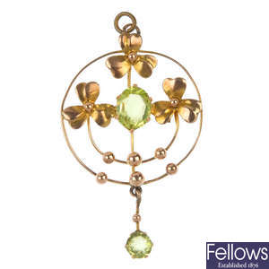 An early 20th century 9ct gold peridot pendant and chain.