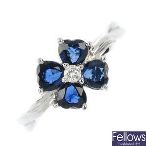 An 18ct gold diamond and sapphire floral ring.