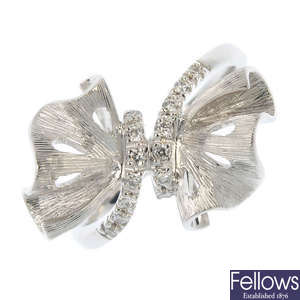 An 18ct gold diamond bow ring.