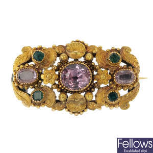 A mid 19th century 18ct gold topaz and emerald cannetille brooch.