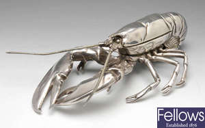 A silver plated lobster inkwell.