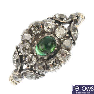 An early 19th century silver and gold green-gem and diamond cluster ring.