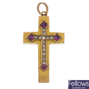 A late Victorian 9ct gold diamond and ruby cross pendant.