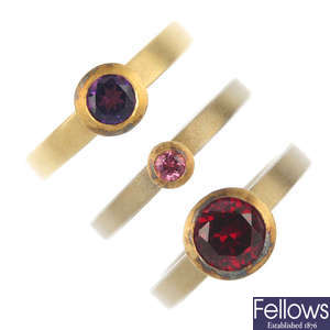 One 18ct gold and two silver gem-set single-stone rings.