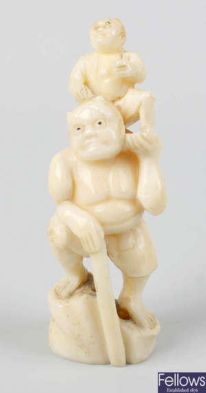 A small Japanese ivory figure 