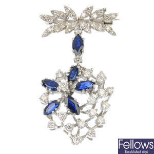 An 18ct gold sapphire and diamond floral pendent brooch.