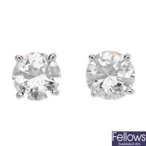 A pair of 18ct gold diamond single-stone ear studs.