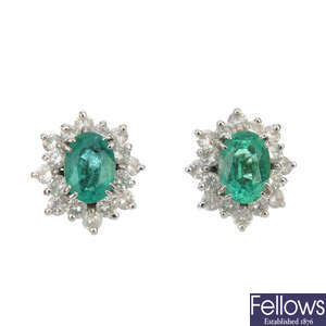 A pair of 18ct gold emerald and diamond cluster ear studs.