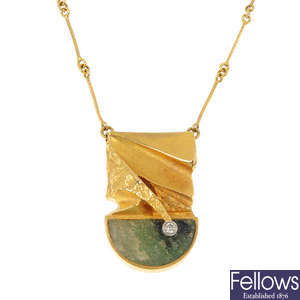 LAPPONIA - an 18ct gold emerald matrix and diamond pendant.