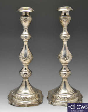 A 1920's pair of silver Judaica candlesticks.