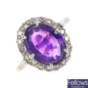 An 18ct gold amethyst and diamond cluster ring.