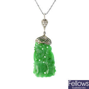 An early 20th century jadeite and diamond pendant.
