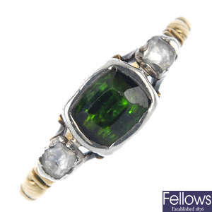 A mid 19th century silver and 18ct gold tourmaline and diamond three-stone ring.