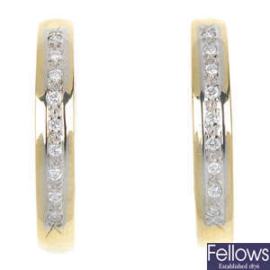 A pair of 18ct gold diamond hoop earrings.