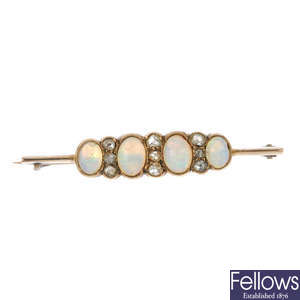 An early 20th century 9ct gold opal and diamond bar brooch.