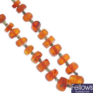 An opaque and translucent natural amber bead necklace.