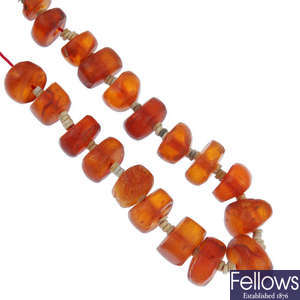 A Moroccan design necklace of natural amber beads with stone spacers.