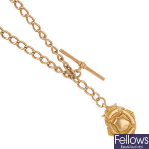 An early 20th century 9ct gold medallion and Albert chain. 