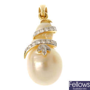 A cultured pearl and diamond accent pendant.