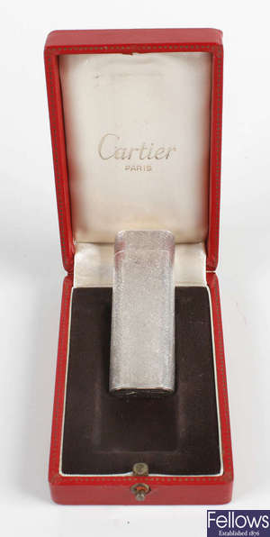 A Cartier white metal lighter