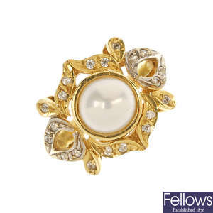 A mabe cultured pearl and cubic zirconia ring. 