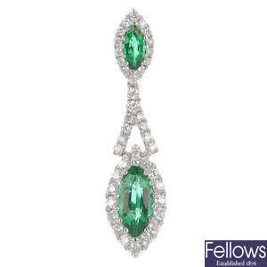 An emerald and diamond pendant. 