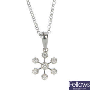 An 18ct gold diamond snowflake pendant.