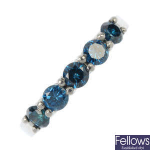 A platinum colour treated 'blue' diamond five-stone ring.