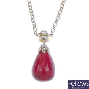 A ruby and diamond bi-colour pendant.