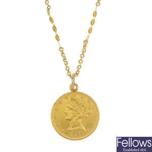 A coin pendant and chain. 