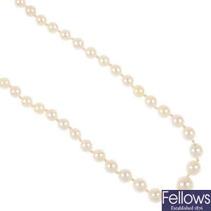 A cultured pearl single-strand necklace with a 9ct gold amethyst and split pearl clasp.