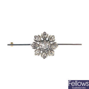 An early 20th century silver and gold diamond floral bar brooch.