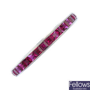 A synthetic ruby full-circle eternity ring. 