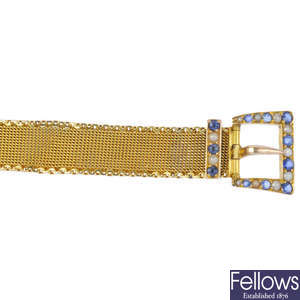 An early 20th century 9ct gold split pearl and sapphire buckle bracelet.
