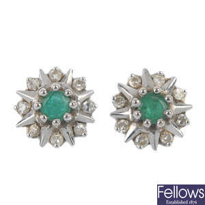 A pair of 18ct gold emerald and diamond cluster ear studs.