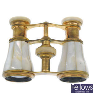 Two pairs of mother-of-pearl opera glasses.